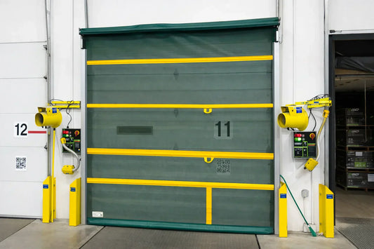 Green Bug Screen Roll-Up Door. Mounted on a Loading dock.
