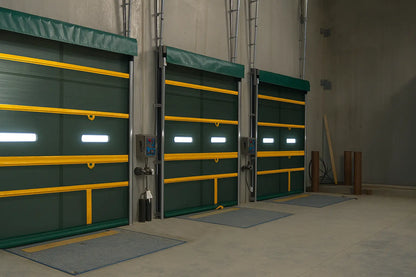 Bug Screen Roll up Doors. Green screen yellow safety stripes. Installed as a stand off in a dock